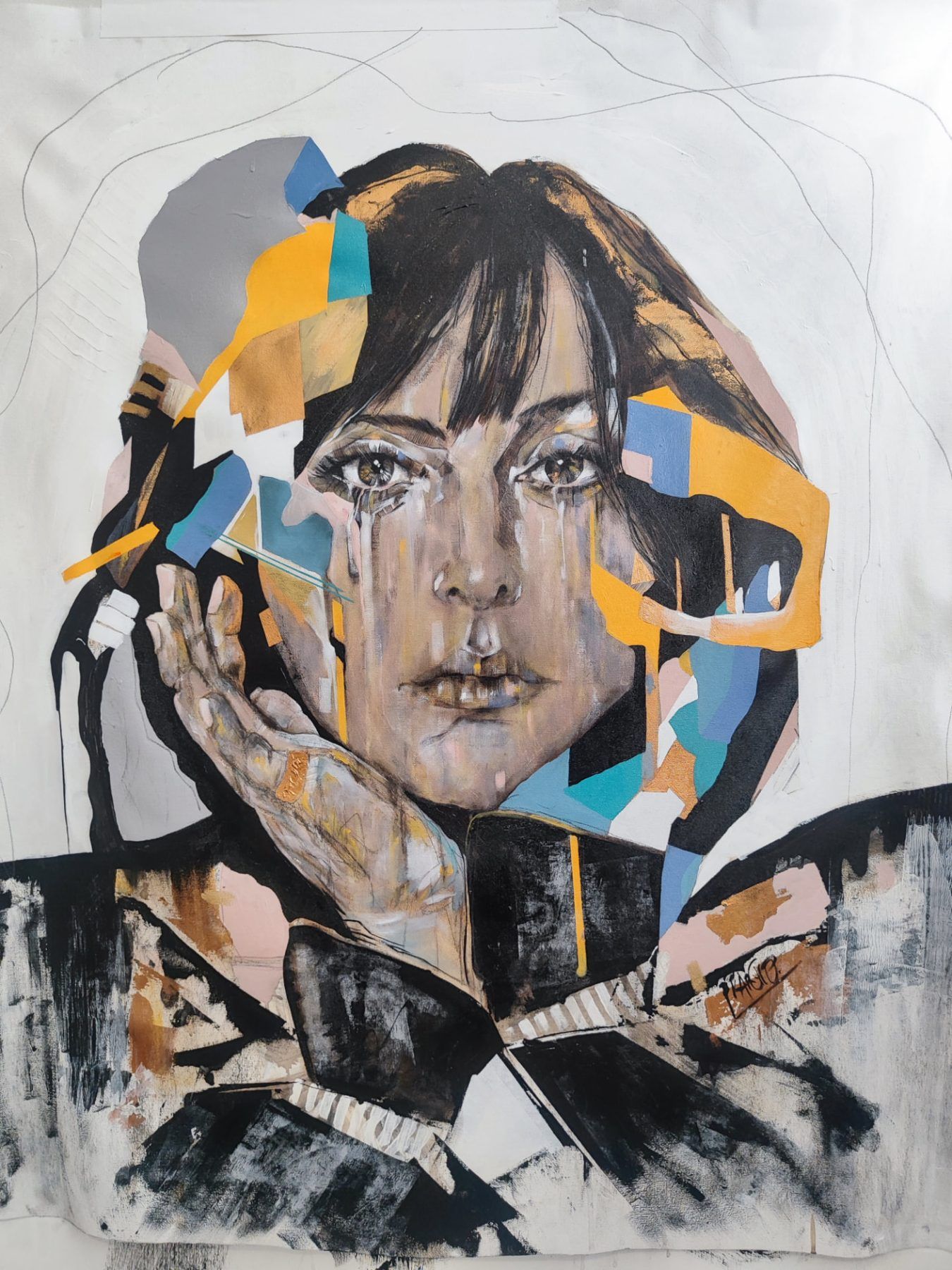 Candela, contemporary figurative portrait by PilarchoArt: a woman's face resting on her hand, surrounded by yellow, blue and gold geometric fragments over a white ground.